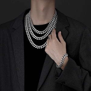 Close-up of hip hop silver Cuban chain necklace with sparkling full cubic zirconia paving