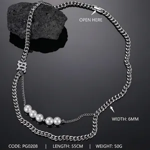 Detail view of 6mm thick stainless steel chain with white pearls and B letter pendant