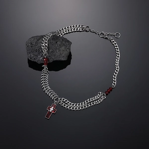 Detail view of double-layer titanium steel necklace with red cross pendant and gothic chain