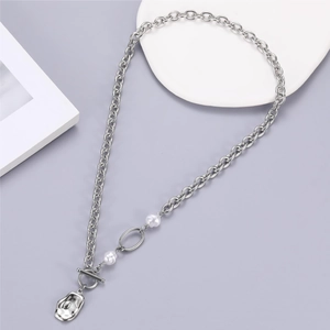 Modern silver irregular lava pendant necklace with pearls and toggle clasp