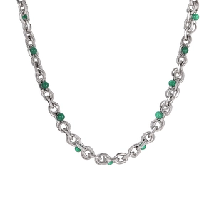 Detail of titanium steel chain with green spherical beads for a minimalist look