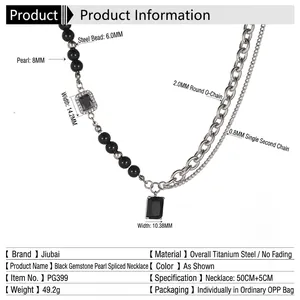 Titanium steel necklace with black gemstones and 8mm pearls on white background