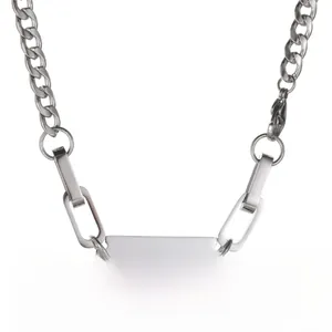 Close-up of titanium steel necklace featuring a unique razor blade pendant and spliced chains