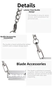 Detailed macro view of blade-shaped pendant with engraving and lobster clasp on steel chain