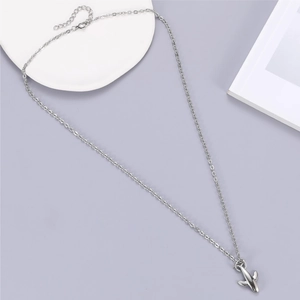 Detailed view of silver aircraft pendant necklace with O-chain and lobster clasp