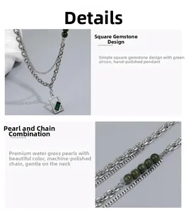 Close-up of titanium steel necklace with green zircon pendant and mixed bead chain