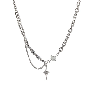 Star pendant necklace with cat eye stone and asymmetrical curb chain in silver stainless steel
