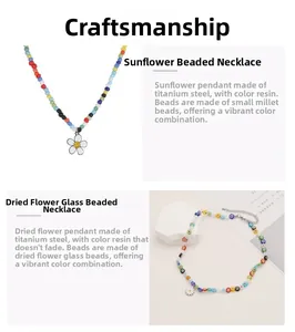 Close-up of titanium daisy necklace with colorful beads and dried flower glass beads