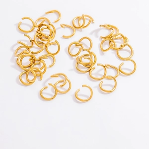 Close-up of 18K gold plated stainless steel jump rings for DIY jewelry making