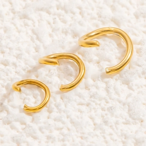 Detailed set of three gold-plated 18K C-shaped ear cuffs in small, medium, and large sizes