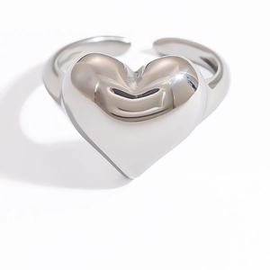 Polished silver 3D heart-shaped ring with an adjustable open band on a white background