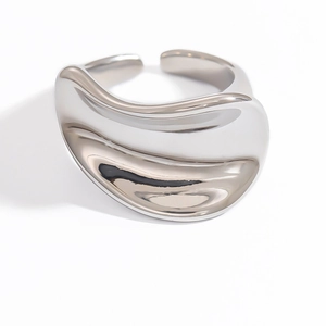 Macro detail of silver adjustable ring with polished liquid metal irregular wavy design