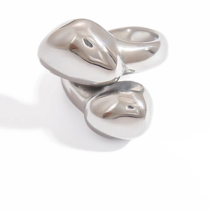Detailed view of silver irregular liquid metal ring with smooth polished lava design finish