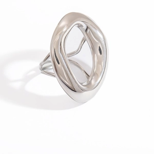 Macro shot of silver irregular wave ring with high-gloss polished stainless steel finish