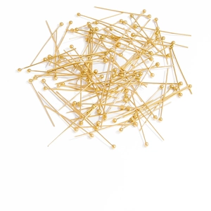 Detailed pile of 18K gold-plated stainless steel ball headpins for DIY jewelry making