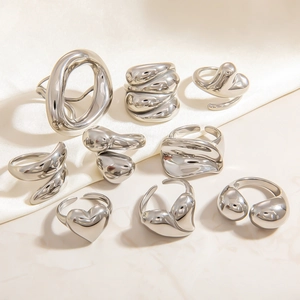 Irregular silver liquid metal rings set with heart and wavy textures for women