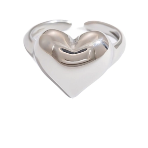Polished silver heart shaped open ring with minimalist adjustable metallic band for women