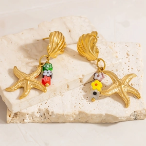 Boucles d'oreilles en acier doré avec perles de fleurs et pendentifs étoile de mer
