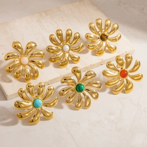 Detailed set of 18k gold plated titanium rings with various colorful natural stone flowers