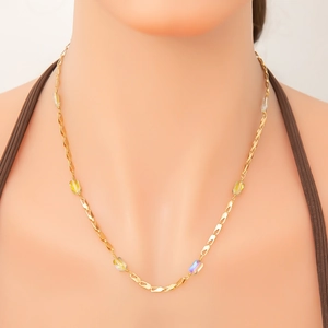 Detail view of 18K gold plated chain with iridescent rainbow rectangular glass beads