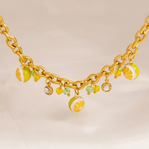 Bracelet en acier inoxydable plaqué or 18 carats avec citrons et cristaux