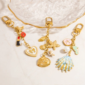 18K gold plated pearl bag charm with seashell and starfish pendants in three luxury styles