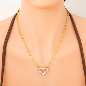 Detail of mixed-metal paperclip chain necklace with silver-tone heart-shaped clasp toggle