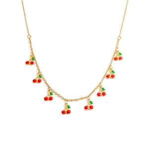 Detail of gold chain necklace with seven red and green enamel cherry pendants