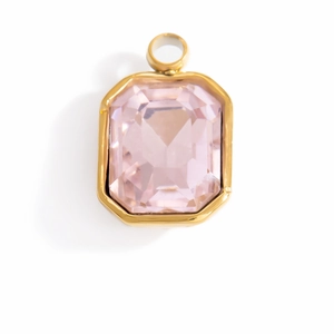 Detailed view of rectangular pink glass pendant with faceted cut and gold plated frame