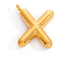 Detailed close-up of 3D balloon style letter X pendant in polished golden stainless steel