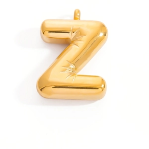 Detailed view of a gold 3D balloon letter Z pendant with sunburst engraving for DIY jewelry