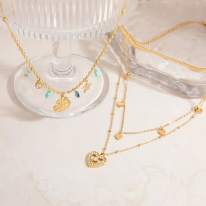 Collana in acciaio inossidabile dorato con ciondolo a conchiglia e gioielli a cuore doppio