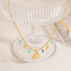 Collana donna oro 18K pendente conchiglia stella marina e perline turchesi su vetro