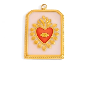 Detailed macro view of a gold-tone sacred heart pendant with devil eye and pink drip oil