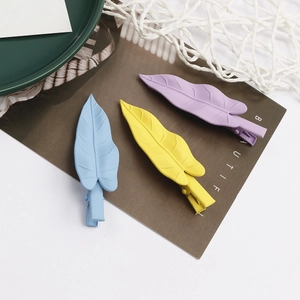 Matte leaf shaped metal hair clips in blue yellow and purple colors for women