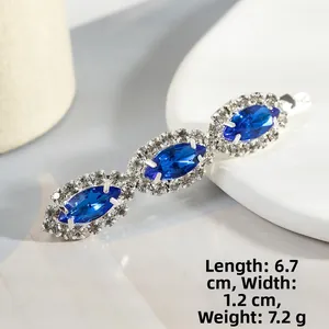 Close-up of sparkling blue marquise crystal hair clip with 6.7cm length measurement