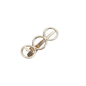 Elegant gold geometric hair clip with three hollow circles and non-slip duckbill grip