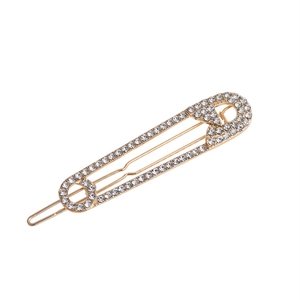 Elegante gouden veiligheidsspeld haarklem met fonkelende witte strass steentjes