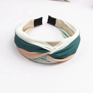 Elegant Korean style wide twisted headband with green pink and white patchwork design