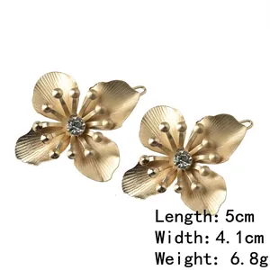 Pair of gold floral hair clips with crystals and brushed alloy finish, 5cm length