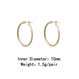 Detailed view of 10mm inner diameter gold round hoop earrings weighing 1.5g per pair