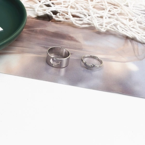 Matching dolphin open rings for couples featuring hollow design and adjustable bands