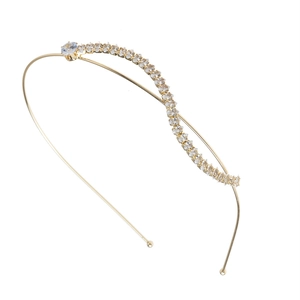 Serre-tête doré élégant orné de strass scintillants sur fond blanc pour femme