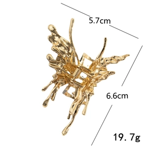 Goldene Haarklammer Schmetterling aus Flüssigmetall mit 5.7x6.6cm Maß und 19.7g Gewicht