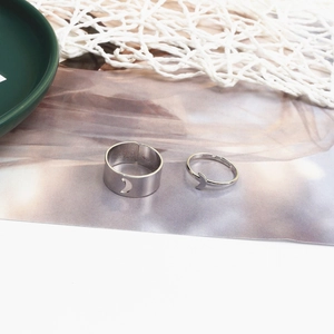 Detail of vintage silver moon hollow couple rings set with adjustable open band design