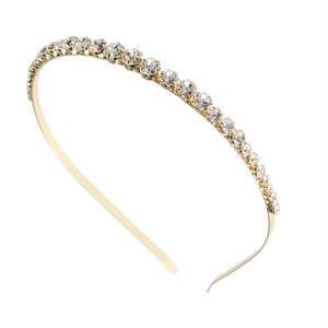 Serre-tête fin doré avec oxydes de zirconium brillants pour femme sur fond blanc épuré