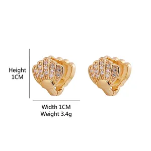Shell-shaped gold plated earrings with micro-set cubic zirconia and snap closure details