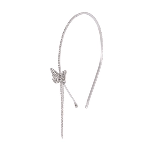 Serre-tête papillon argenté élégant avec strass brillants et de longs pompons pendants