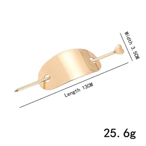 Elegant gold metal hair stick with heart charm and minimalist curved cuff hair pin