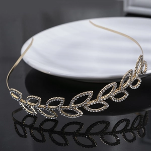Elegant gold leaf headband with sparkling rhinestones for bridal hair accessories
